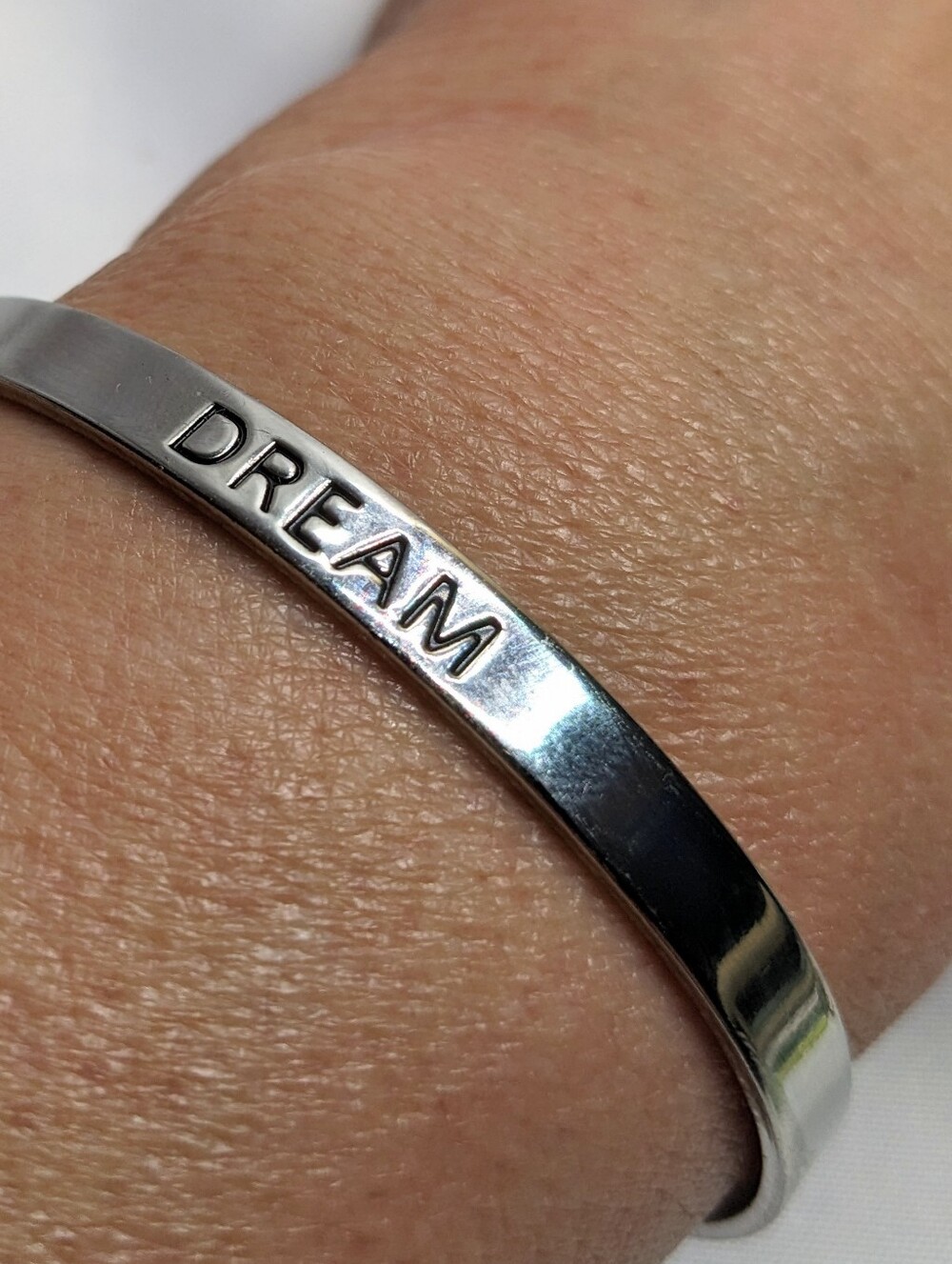 "DREAM" Slim Stackable Cuff Bracelet, Silvertone, Bold Black Lettering, Sz 7?